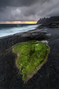 Rocky coast of Tungeneset, walking time pool, rocky peak Devils Teeth, Devil's Teeth, Okshornan, stone fjords, Senja Island, Troms, Norway