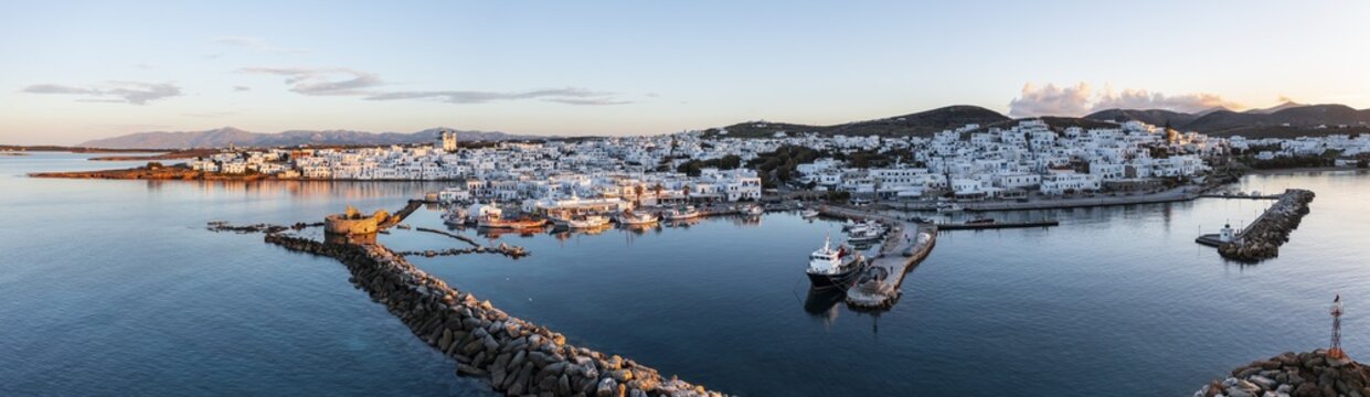 Evening atmosphere, aerial view, town view and harbour of Naoussa, harbour wall with Venetian ruins, Paros, Cyclades, Greece