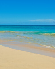 Fototapeta premium Boa Vista, Cabo Verde África: - 22 de marzo de 2026: Praia Lacacao in Boa Vista, Capo Verde is a stunning beach with crystal clear waters and white sand. This was on a hot sunny afternoon. This is a p