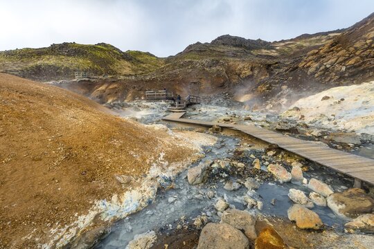 Boardwalk over steaming ground, mineral deposits, Selt&uacute;n geothermal area, Kr&yacute;suv&iacute;k volcanic system, Reykjanesf&oacute;lkvangur conservation area, Iceland