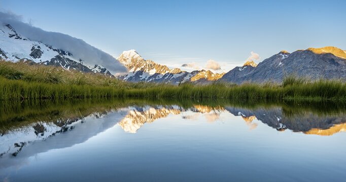 Mount Cook at sunset, reflection in mountain lake, Sealy Tarns, Hooker Valley, Mount Cook National Park, Southern Alps, Canterbury, South Island, New Zealand