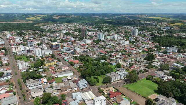 Lagoa Vermelha aerial panorama with wide rotating view over neighborhoods and urban center.