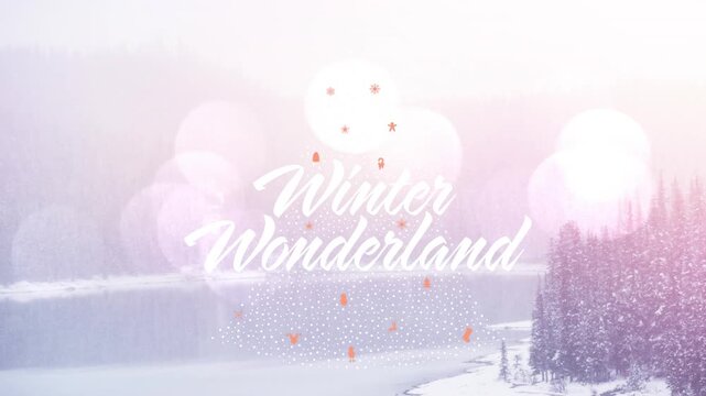 Animation of winter wonderland text at christmas over fir trees