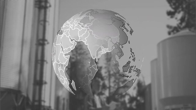 Animation of globe rotating over factory