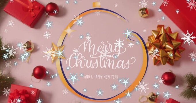 Animation of christmas greetings text over christmas decorations