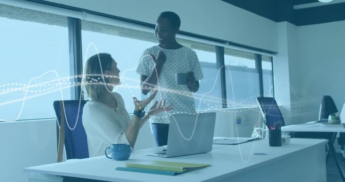 Seated woman pitching business plan, gesturing laptop, wave syncing hands, peer agreeing