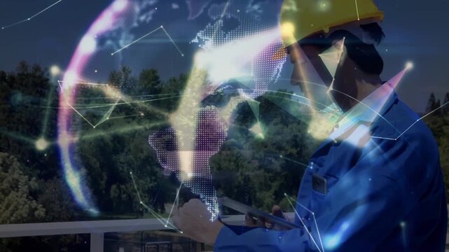 Field engineer lifting sensor and tapping tablet initiating 3D network globe visualizing tech data