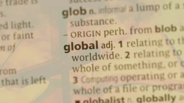 Soft-focus starting, camera lens pulling focus, revealing bold headword global and definitions