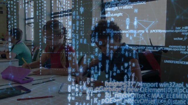 Wheelchair pupil writing with peers on notes and classwork while projecting code overlay over table