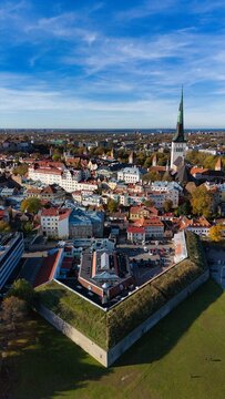 Drone View of Medieval Tallinn Old Town and St Olaf Church Spire Estonia
