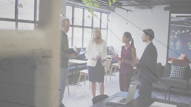 Approaching colleague in casual shirt presenting folder to team at office for review, with laptop