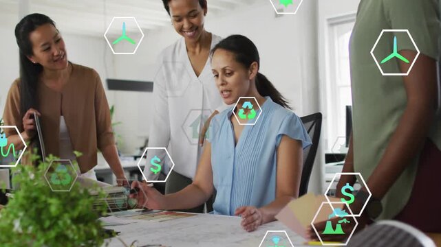 Review starting, seated lead pointing, marking plans in design, hex icons showing energy focus