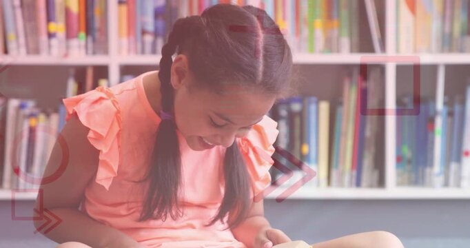 Girl sitting crosslegged reading book by shelf, opening page causing moving overlays for education