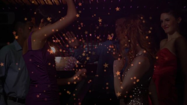 Music pulsing, five partygoers dancing at event under slatted roof, star overlay bathing group