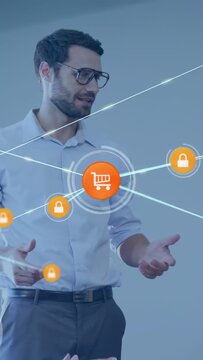 Presenter gesturing while orb appearing morphing into cart, forming ecom grid and showing security