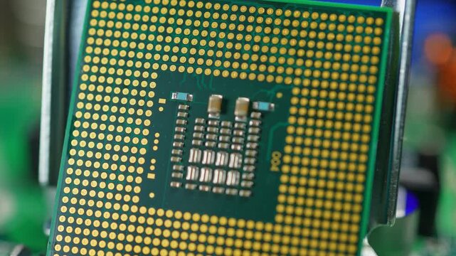 Display of CPU chip as result of engineering design and use of mining of rear earth materials. Rare earth elements, REE play critical role in CPU GPU RAM and SSD production for AI data centers.