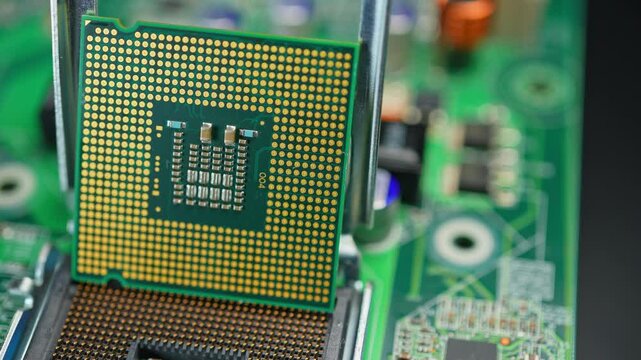 Display of CPU chip as result of engineering design and use of mining of rear earth materials. Rare earth elements, REE play critical role in CPU GPU RAM and SSD production for AI data centers.