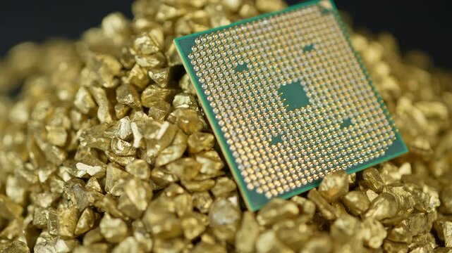 CPU Central Processing Unit of the computer in the pile of gold. Concept of AI boom triggered a massive shortage of CPUs, driving prices high as tech giants hoard components for data centers.