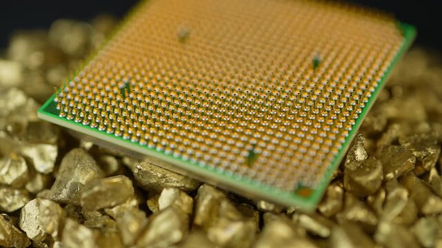 CPU or GPU in pile of gold nuggets display, concept of rear earth elements mining demand. Mining and AI global demand for REEs. Building of data centers and processing power for AI and LLMs.