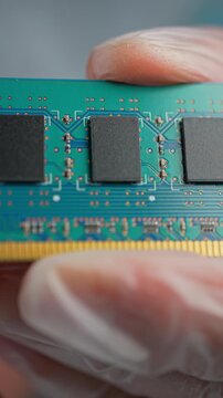 RAM stick with DRAM, Dynamic Random Access Memory chips. Core storage components holds data temporarily for quick CPU access. Storage of binary information using billions of capacitors and transistors