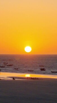 Cinematic Golden Sunset Scene with Human Silhouettes and Kite over Ocean
