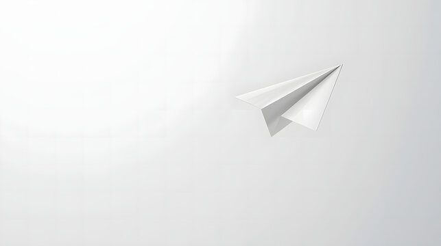 white paper airplane shaped like an arrow flying on a clean gray background