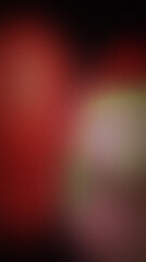 Obraz premium Close-up of a blurred, grainy red background, with a bright, white circular highlight, grainy texture blurred, white circle