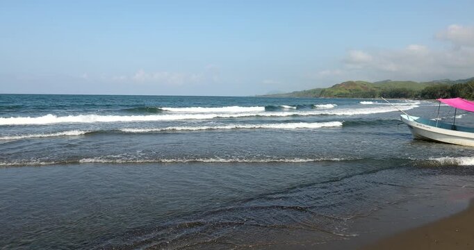Boats line the shore of Roca Partida Beach in Arroyo de Liza, Veracruz, Mexico.