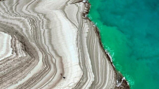 Scala dei Turchi, or the Turkish stairs in Sicily, Italy. Aerial Drone Shot. Unique White Rocks and Turquoise water.
