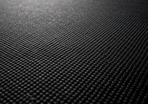 Abstract close-up view of a dark woven carpet featuring subtle, narrow horizontal lines, providing a sophisticated textile background, dark, floor covering, background