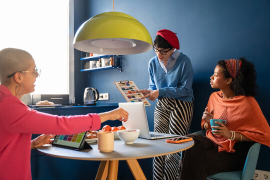 Creative women collaborating in a modern business setting