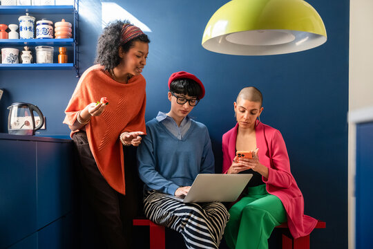 Creative teamwork among diverse businesswomen