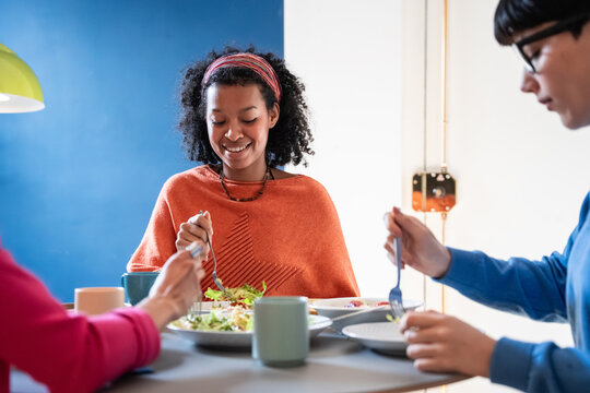 Businesswomen collaborating creatively over lunch