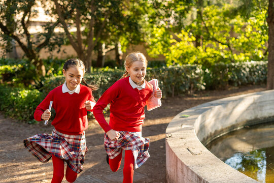 Children running energetically in a school race