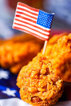 Close-up of chicken wing with USA flag for July 4 party