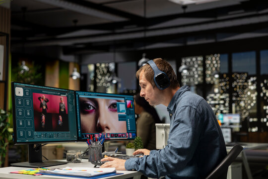 Skilled photo editor working on creative editing and generating content, creating materials for the portfolio with artificial intelligence. Professional designer employs AI chatbot.