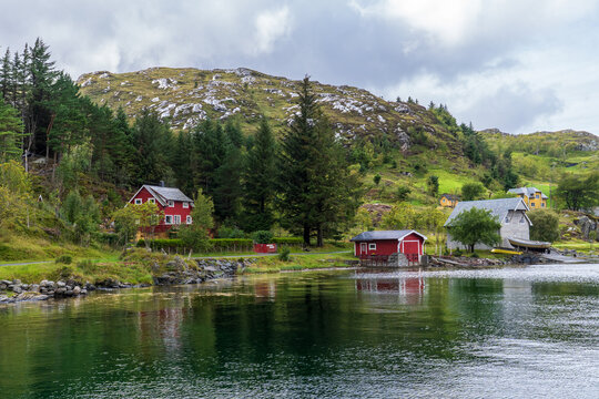 Traditional Red House and Boathouse in Sortland, Norway