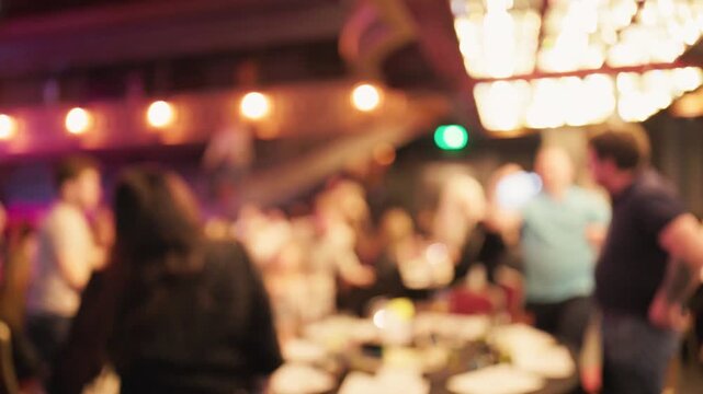 Candid visuals of business professionals mingling at bustling event venue