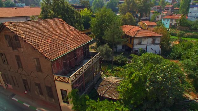 Historic Ottoman Houses in Green Bursa with Lush Nature Backdrop