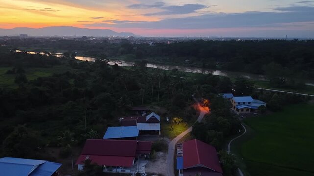 Aerial Labuh Banting river village at dusk