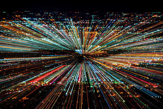 Bright city lights zoomed in at night