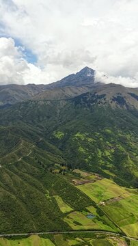 Cinematic Aerial View of Laguna Cuicocha with Cotacachi Volcano in Ecuador
