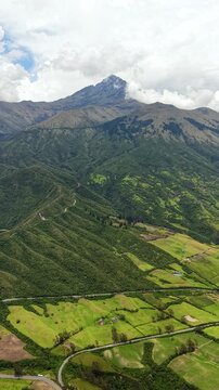 Cinematic Aerial View of Laguna Cuicocha with Cotacachi Volcano in Ecuador