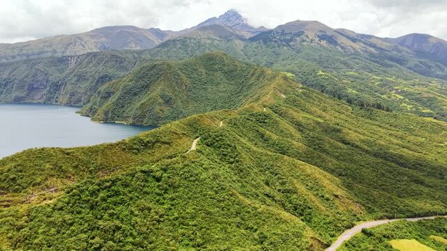 Cinematic Aerial View of Laguna Cuicocha with Cotacachi Volcano in Ecuador