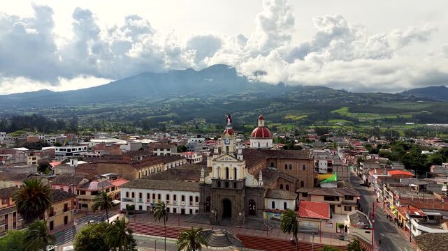 Cinematic Aerial View of Cotacachi with Central Cathedral and Andean Landscape