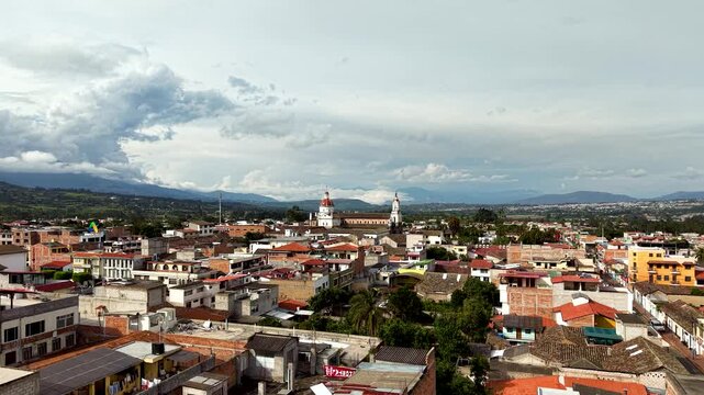 Cinematic Aerial View of Cotacachi with Central Cathedral and Andean Landscape