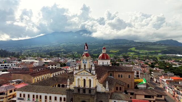 Cinematic Aerial View of Cotacachi with Central Cathedral and Andean Landscape