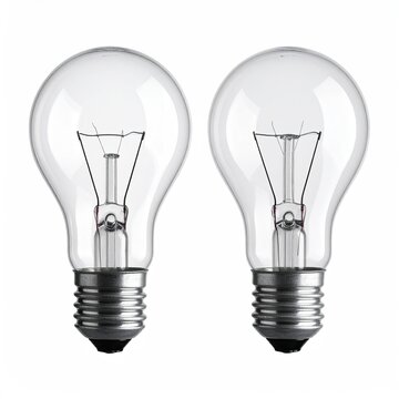 Two clear incandescent light bulbs with visible filaments isolated on a white background for energy and lighting design concepts