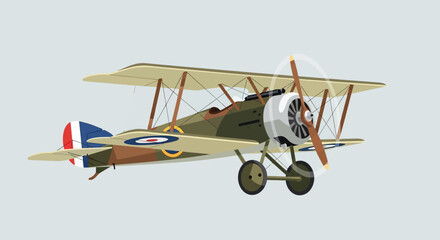 Vintage biplane aircraft flying against a light blue sky © Ayu