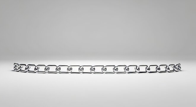 Stylish Silver-Toned Metallic Chain Curving on a Clean White Surface, Modern Minimalist Design